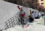 جداريات غزة.. فنانون يرسمون بنكهة المقاومة  